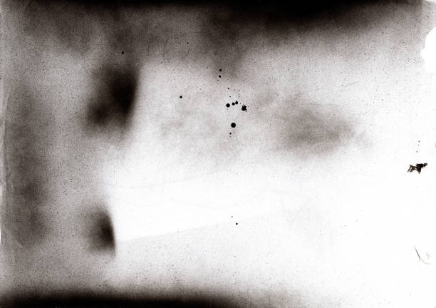 istock Abstract black spray stains on paper, real stains made with spray with fine grain splashes. Resource of spray texture and paper texture. 1851886253