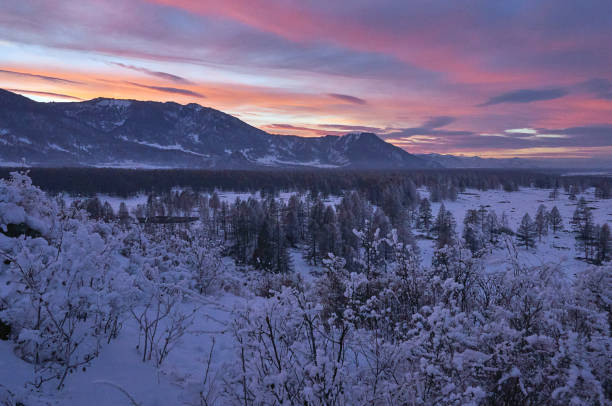 istock Cold snowy mountain landscape at sunset. 1851890552