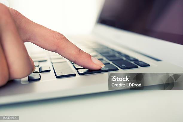 Female Hand Using Computer Keyboard Enter Button Stock Photo - Download Image Now - Adult, Adults Only, Banking