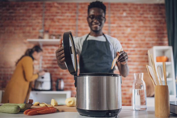 istock Joyful Cooking Time with Pressure Cooker 1851918452