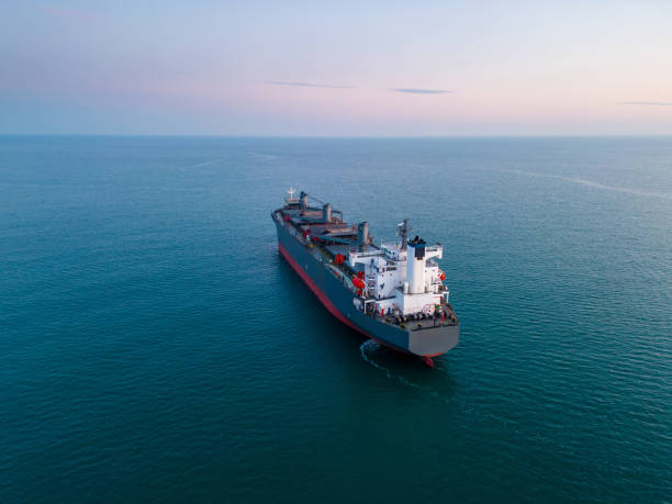 istock A massive cargo ship wood chips carrier in the sea, aerial view 1851918971