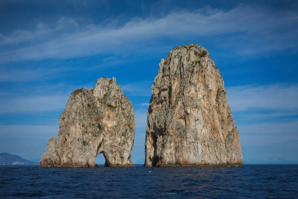 Rock gate in the sea, Punta di Tragara, Faraglioni, Capri, Gulf of Naples, Campania, Italy
