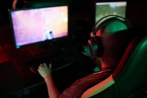 istock Unrecognizable Female Gamer Playing Videogames 1851950662