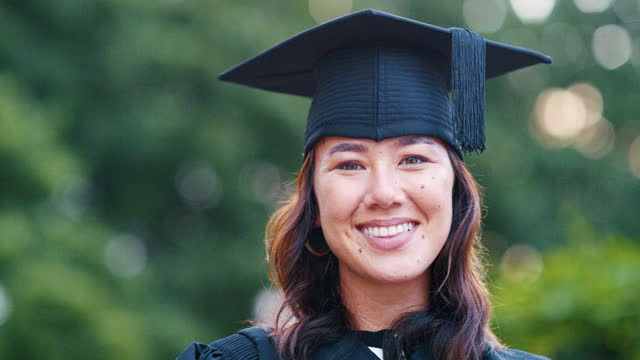 Woman, graduate and smile in portrait, student and school for education success or achievement. Happy female person, confidence and certified by university, face and proud of degree by college campus