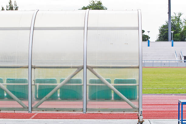 istock Coach and reserve benches in  soccer field 185202630