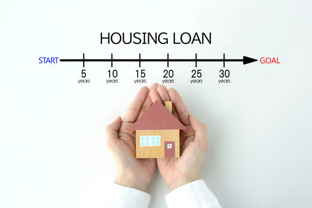 istock Human's hands holding house object and housing loan indication bar 1852028245