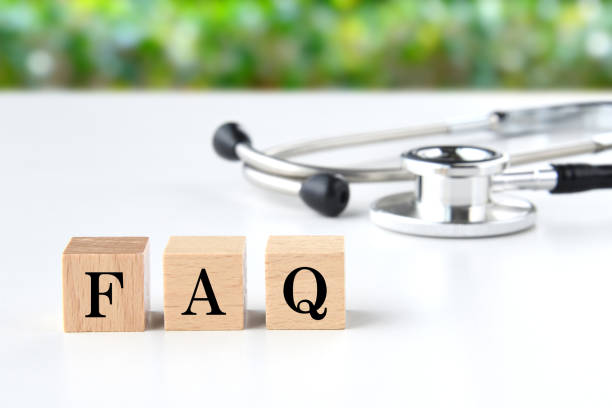 istock Stethoscope and wooden blocks with FAQ words 1852028290