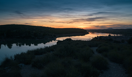 Beautiful sunset landscape with a lake in Almansa, Spain
