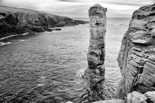 The Yesnaby Castle sea stack and cliffs at Yesnaby on the west coast of the Orkney Mainland in the Orkney Islands off the northeast of Scotland.