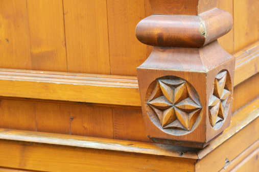 carved and decorated piece of wood belonging to a balcony. Transacqua. Trentino alto adige. italy.