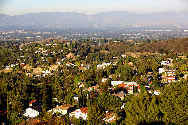 Woodland Hills Panorama in the San Fernando Valley Panoramic view of the Woodland Hills, and the San Fernando Valley of LA, CA as seen from Mullholland Drive looking north woodland hills los angeles stock pictures, royalty-free photos & images