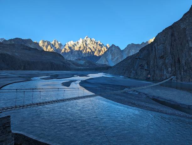 istock Passu Cones, Hussaini Suspension Bridge and Hunza River in one frame 1852073059