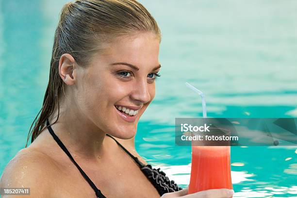 Woman With Cocktail In The Swimming Pool Stock Photo - Download Image Now - Adult, Adults Only, Beautiful People