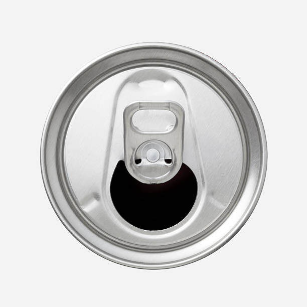 The top of an aluminum soda can with the ring pull showing Close-up top view of a soft drink can. Isolated on white background. on top of stock pictures, royalty-free photos & images