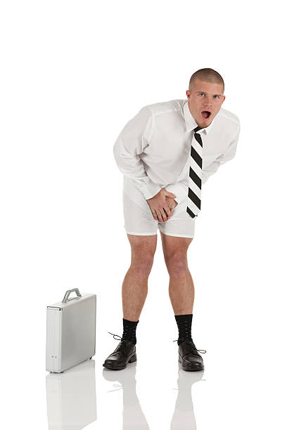 istock Shocked businessman standing without pants on 185207932