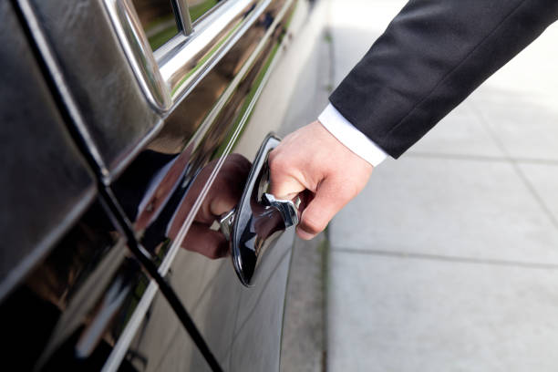 istock Hand Opening Limosine Door 185207973