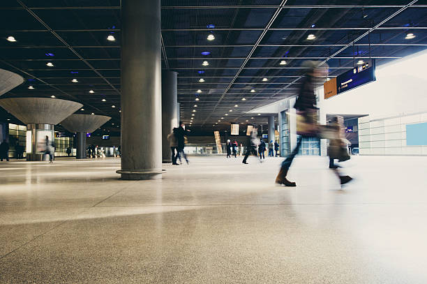 istock Motion blurred strangers at the station 185209559