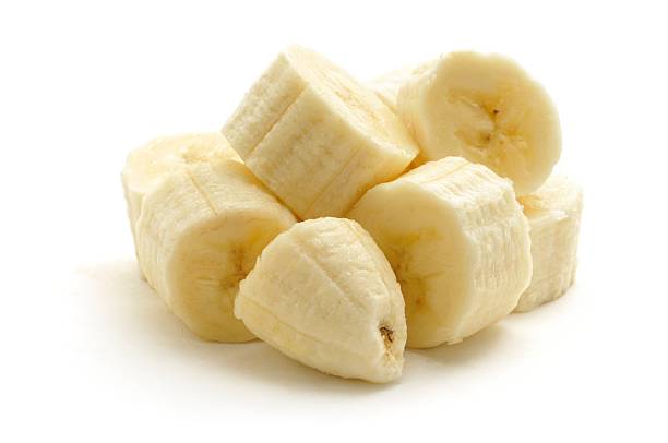banana a pezzi - banana portion chopped fruit foto e immagini stock