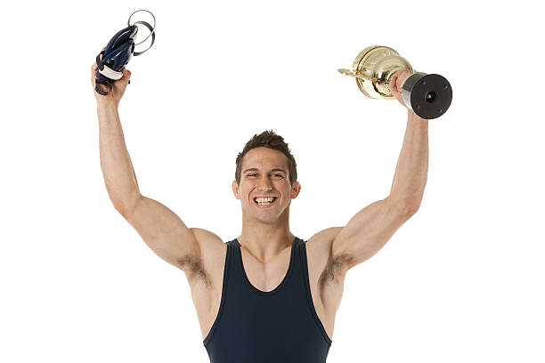 istock Sportsman cheering with trophy 185210203