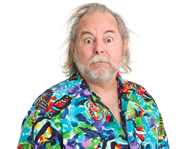 istock Man In Tropical Hawaiian Shirt Raises Eyebrows 185210258