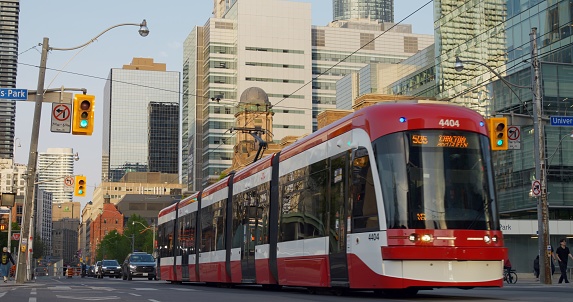 Toronto, Canada - May 6, 2023: Tram streamlines journey, shift travel dynamics. Showcases tram journey enhancer, offering swift, convenient journey. highlights tram's role modern travel experience.