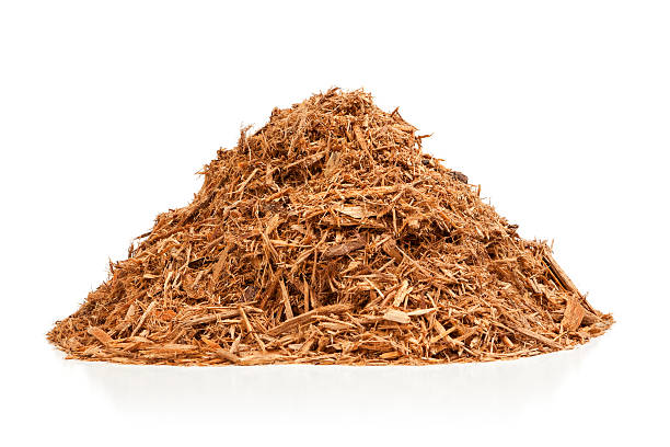 Cypress Mulch Pile of red cypress mulch isolated on white.Please also see: wood chip stock pictures, royalty-free photos & images