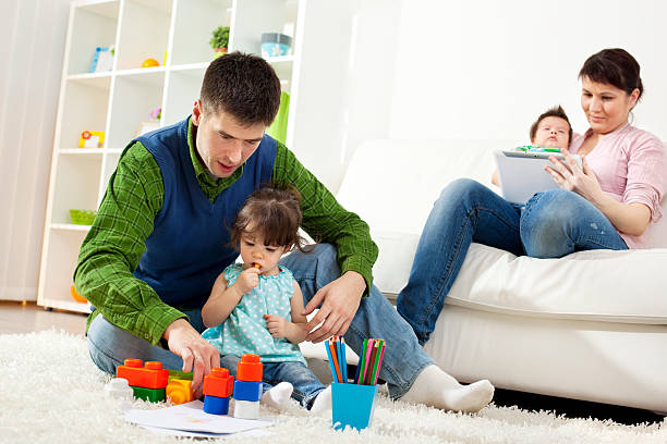 istock Family Havin Fun Together At Home 185210668