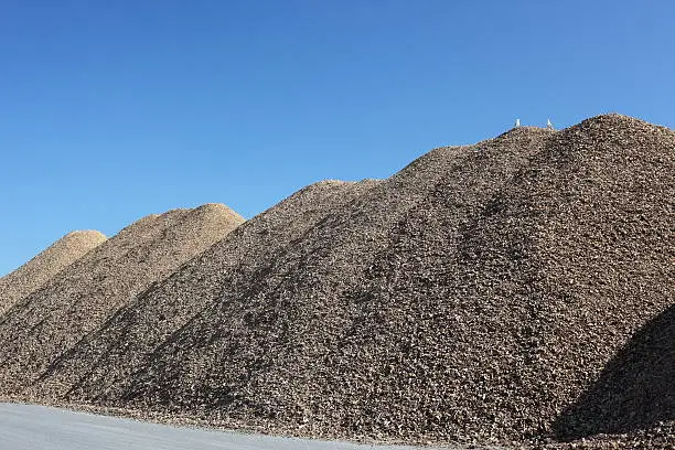 Hills of woodchips - seagulls on the top
