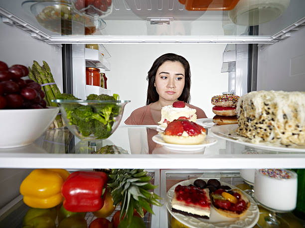 istock Woman Looking at Cake 185211159