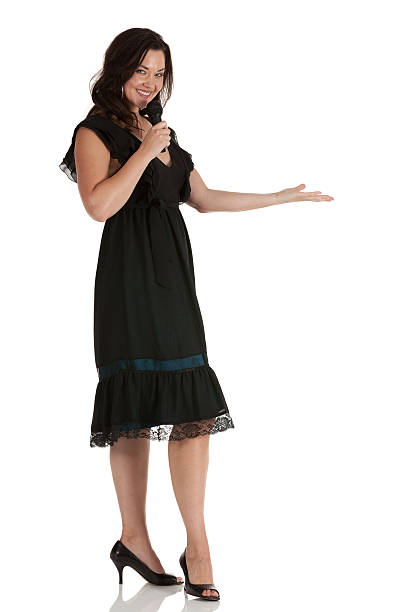 istock Woman singing into a microphone 185211788