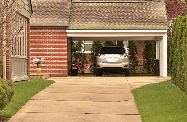 Carport with parked car and Nicely Maintained Grounds stock photo