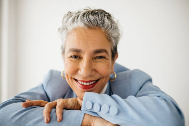 istock The face of success: Classy and experienced business woman smiling in her office 1852122736