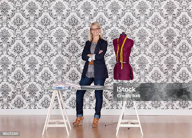 Fashion Designer Standing In Her Workshop Stock Photo - Download Image Now - Tailor, 20-29 Years, Adult