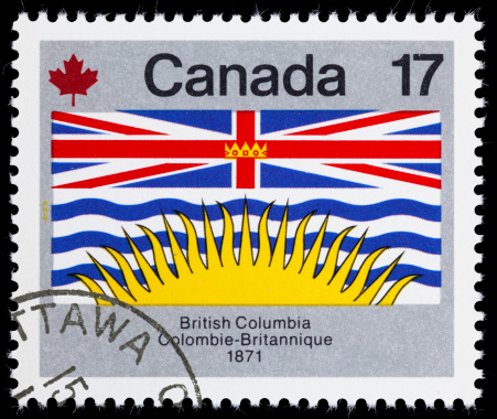 1979 Canada postage stamp with an image of the provincial flag of British Columbia.