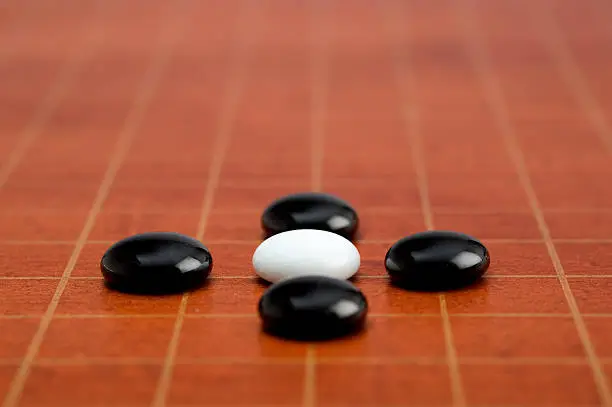 The asian go game. Shallow Dof.