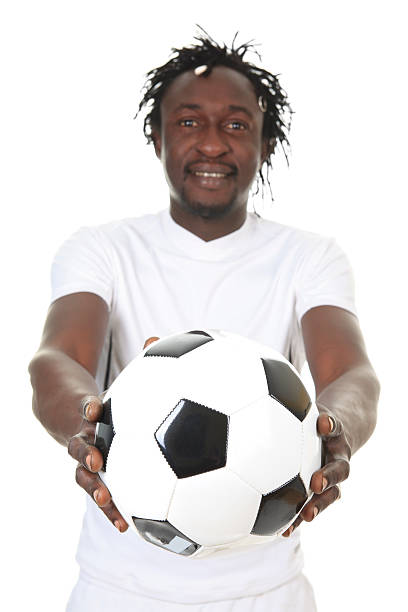 istock African Soccer Player - Focus Ball 185212915