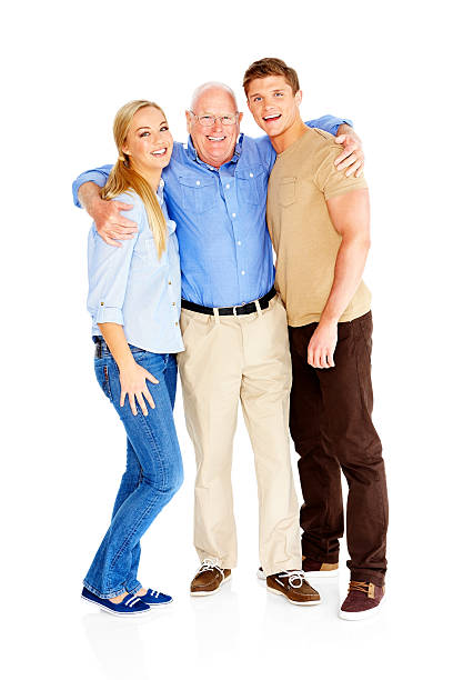 istock Elderly man standing with his young children 185213188