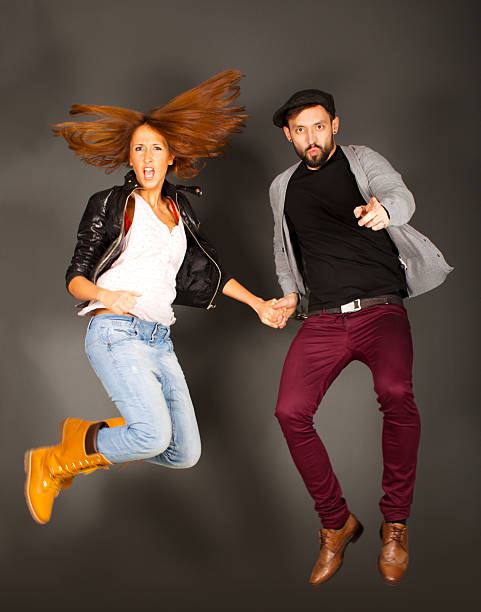 istock Young couple in the jump. 185213774