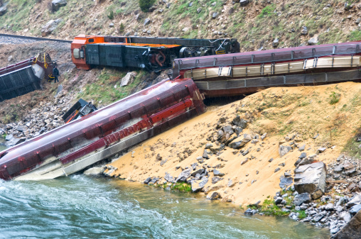 Train derailed by landslide with grain spill and locomotive in river in Wyoming