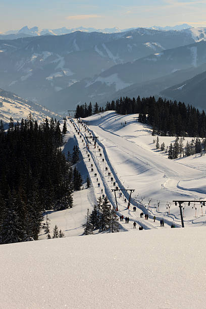 istock skiing people in a drag lift 185214274