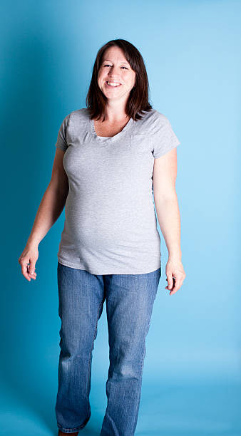 istock Pregnant Women Laughing While On Blue Background 185215688
