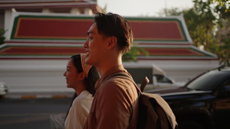 Young couple admiring the Grand Palace in Bangkok, Thailand