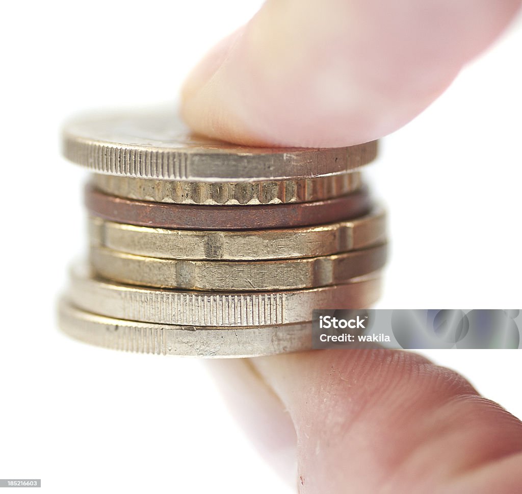 Монеты в области пальцев - Стоковые фото Банковское дело роялти-фри
