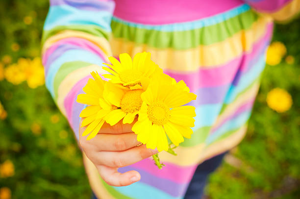 funny girl wearing yellow flower wreath