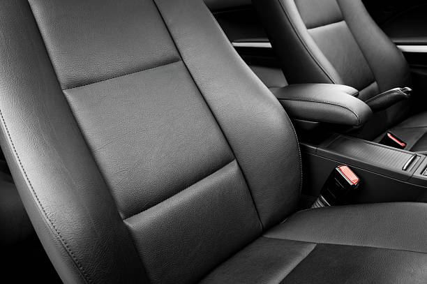 istock Plain black leather car seats in a new car 185217437