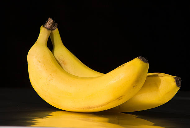 Bunch of two bananas in black