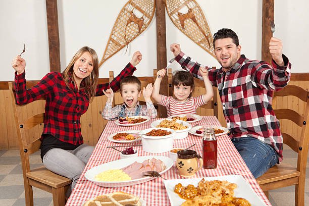 happy family having meal at sugar shack