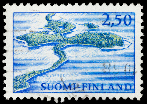 A Finland postage stamp with an illustraton of Punkaharju Ridge, a Finnish national heritage landscape.