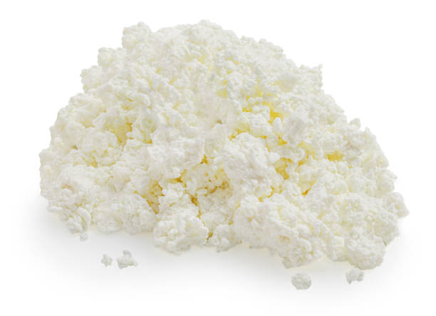 istock Cottage cheese isolated on white background. Fresh cottage Cheese (curds or whey)  is a curdled milk, diary product. Close up 1852180995