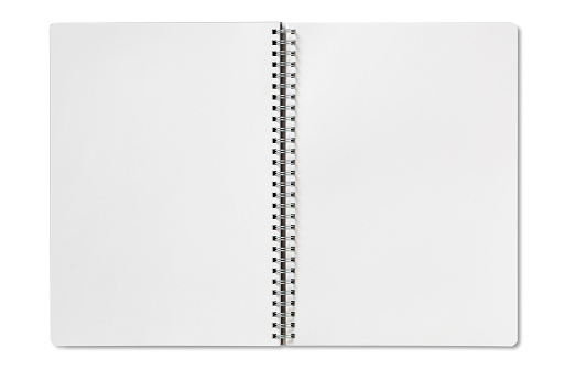 Open spiral notebook on white